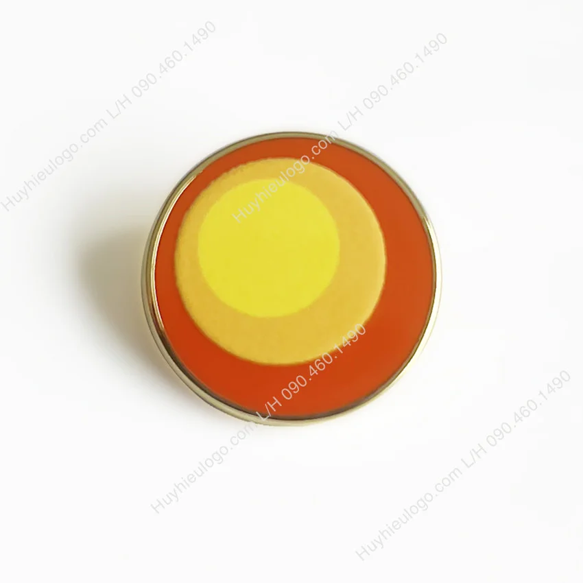 Huy hiệu logo đúc hình tròn in uv